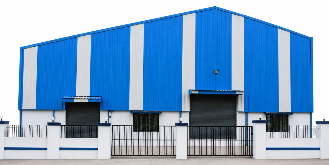 Pre-engineered steel warehouse building with roller-shutter loading doors